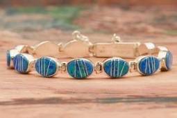 Fire and Ice Opal Sterling Silver Bracelet by Navajo Artist Calvin Begay